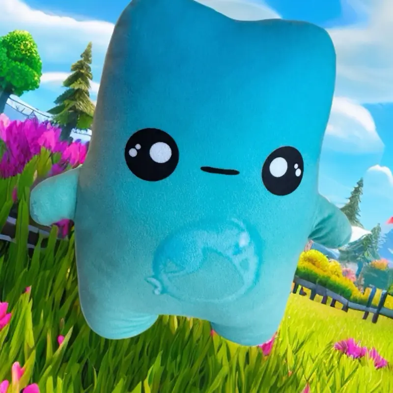 Smooshie Plush Toy - Blue Character with Black Eyes and Smiling Face in Grass Background