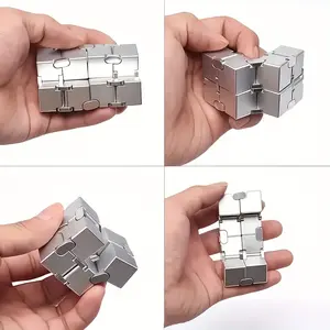 Silver Infinity Rubik's Cube, a stress-relieving toy for adults, a small Rubik's Cube that eliminates boredom and a concentration aid. Made of high-quality electroplated alloy, it is hand-held and educational and serves as a puzzle and