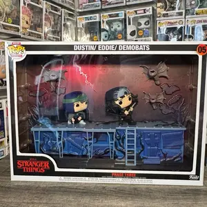Funko Deluxe Pop! Moment Dustin Eddie & Demobats Phase Three Stranger Things Season 4 Collectible with Crack on Display Base