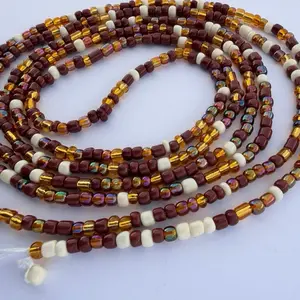 Waistbeads -  Latte is part of our (Coffee Collection). She has multiple browns and golds and cream. She is 60 inches long which fit up to a 4 Xl but you can customize it to be 70 inches long. She is for everyone.
