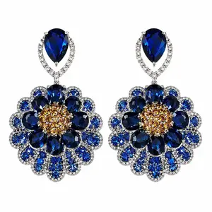 Elegant blue sapphire flower drop earrings—dangling earrings for women featuring sparkling crystals; statement jewelry wedding party accessories