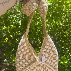 Crochet Granny Square Bag with Bow Handle - Unique Design Handbag for Stylish Use