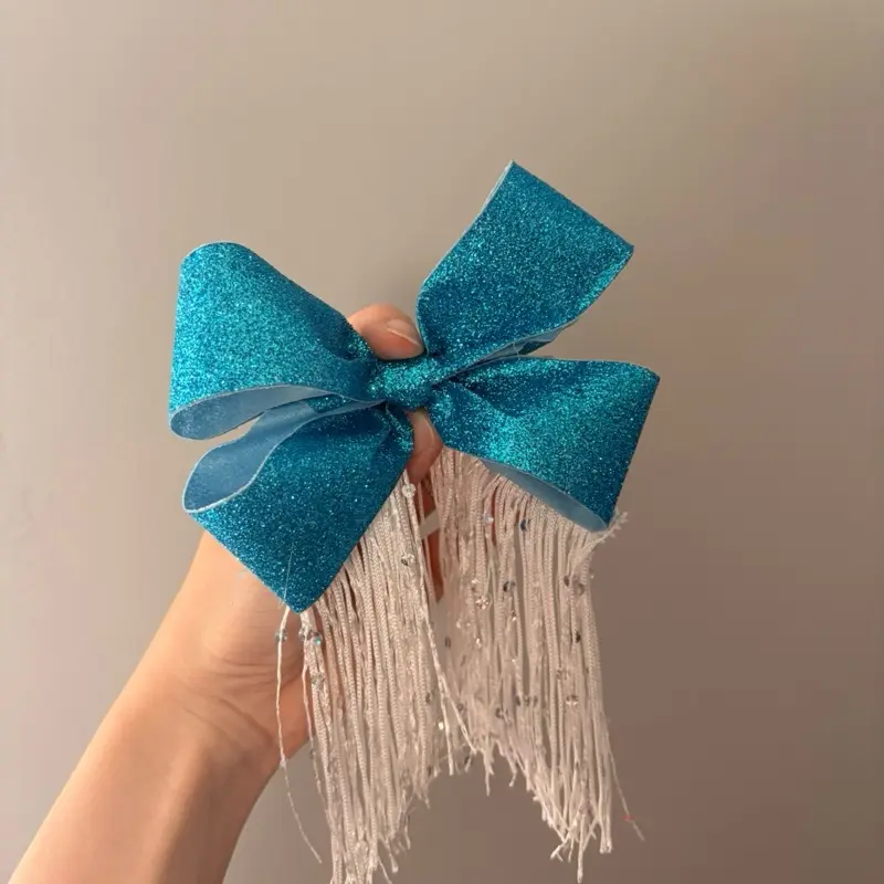 Sparkle Bow - Blue Glitter Hair Accessory with Fringe and Beads for Festive Looks