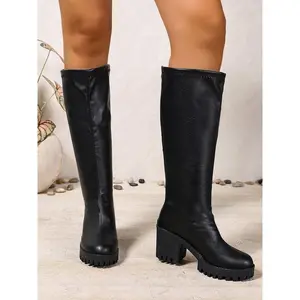 Women’s black leather knee-high boots with a chunky heel and platform design; sleek solid style; autumn–winter footwear; comfortable fashion walking shoes; versatile all-match leisure boots; trendy season-transiting riding-inspired booties