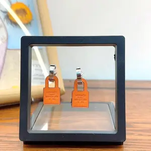 Pre-owned Hermès O'Kelly Earrings Small Model (PM) Palladium Plated Orange Swift Leather qiqia6728