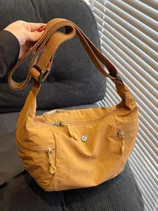 Minority design casual lightweight shoulder bag, lightweight crossbody bag, wide shoulder strap adjustable messenger bag commuter shoulder bag, personality versatile classic literary style, suitable for daily travel, shopping and dating.