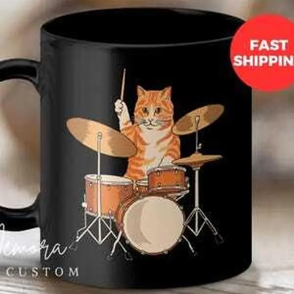 Funny Cat Playing Drums Mug, Unique Animal Lover Gift, Music Enthusiast Coffee Cup, Cute Kitten Drummer Design, Black Mug