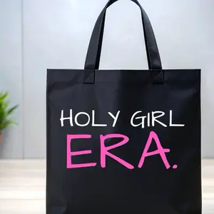 Holy Girl Era Black Canvas Tote Bag with Bold Pink and White Text for Everyday Use