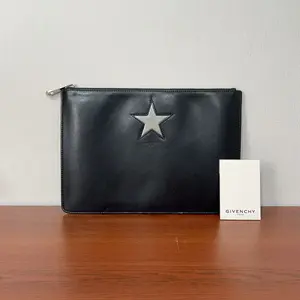 Pre-owned GIVENCHY Leather Clutches & Wristlets Star Embossed Clutch qiqicj7184