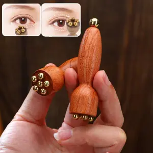 PrimPick Facial Scraper - A wooden traditional Chinese medicine acupoint massager, designed for treating eye bags, dark circles and sensitive skin. The light beige version. A traditional Chinese medicine skincare device
