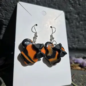 Handmade Minnie Earrings ~ Black & Orange Swirls w/ Black Bows