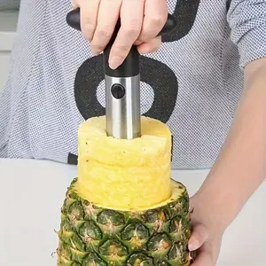 A Stainless Steel Pineapple Corer And Slicer That Is Ergonomically Designed for Comfort. This Multifunctional Tool Is Great for Removing Cores from Fruits Like Strawberries And Is a Handy Kitchen Gadget for Peeling And Slicing. The Pineapple Corer A