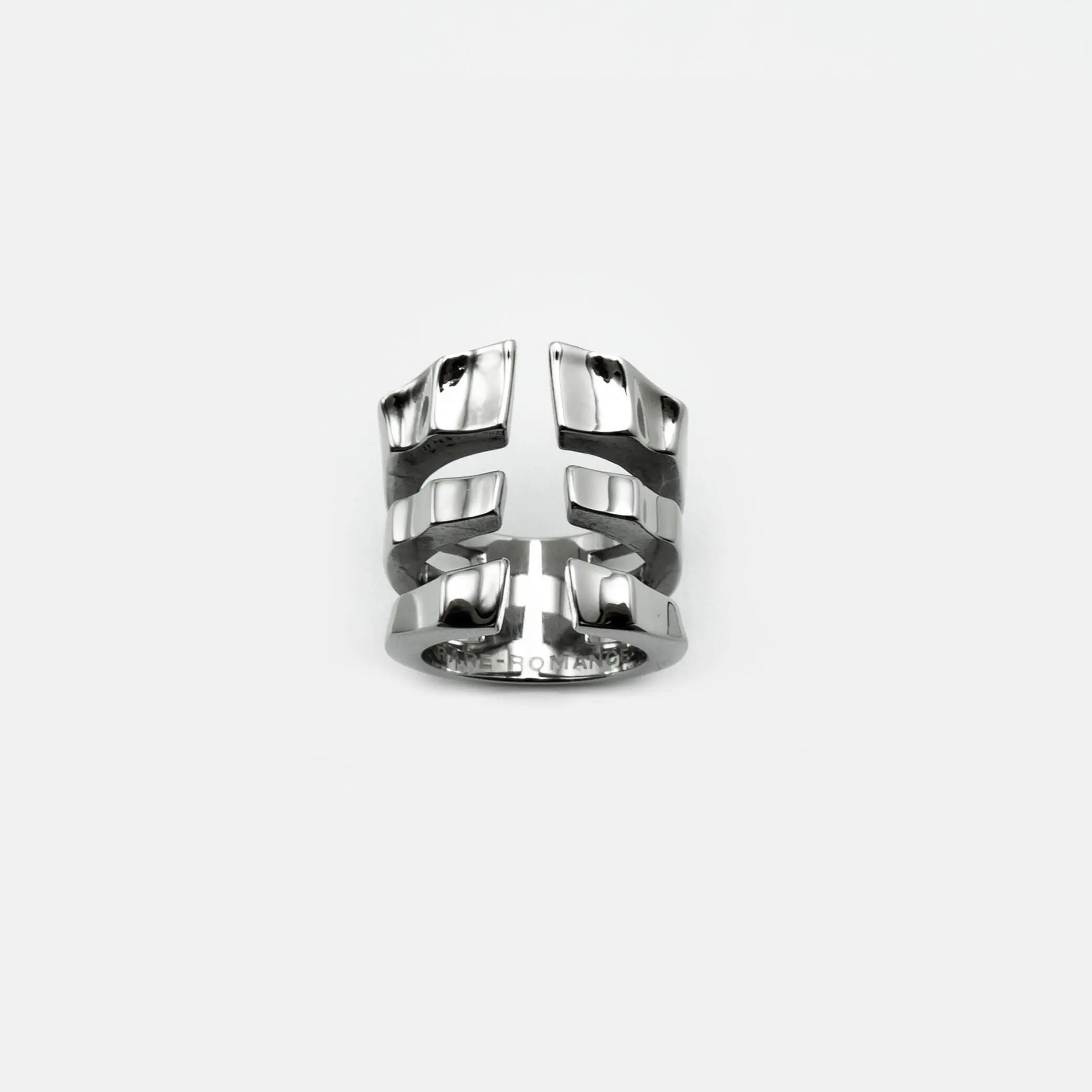 CAGED EXO-ARMOUR RING
