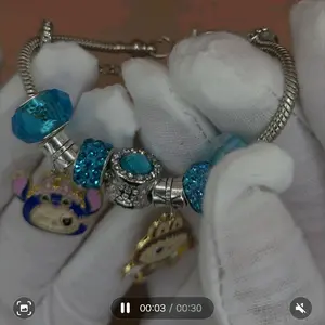 Adorable sterling silver-plated charm bracelet  Adjustable for all wrist sizes and comes with all the cute charms  Perfect gift for kids