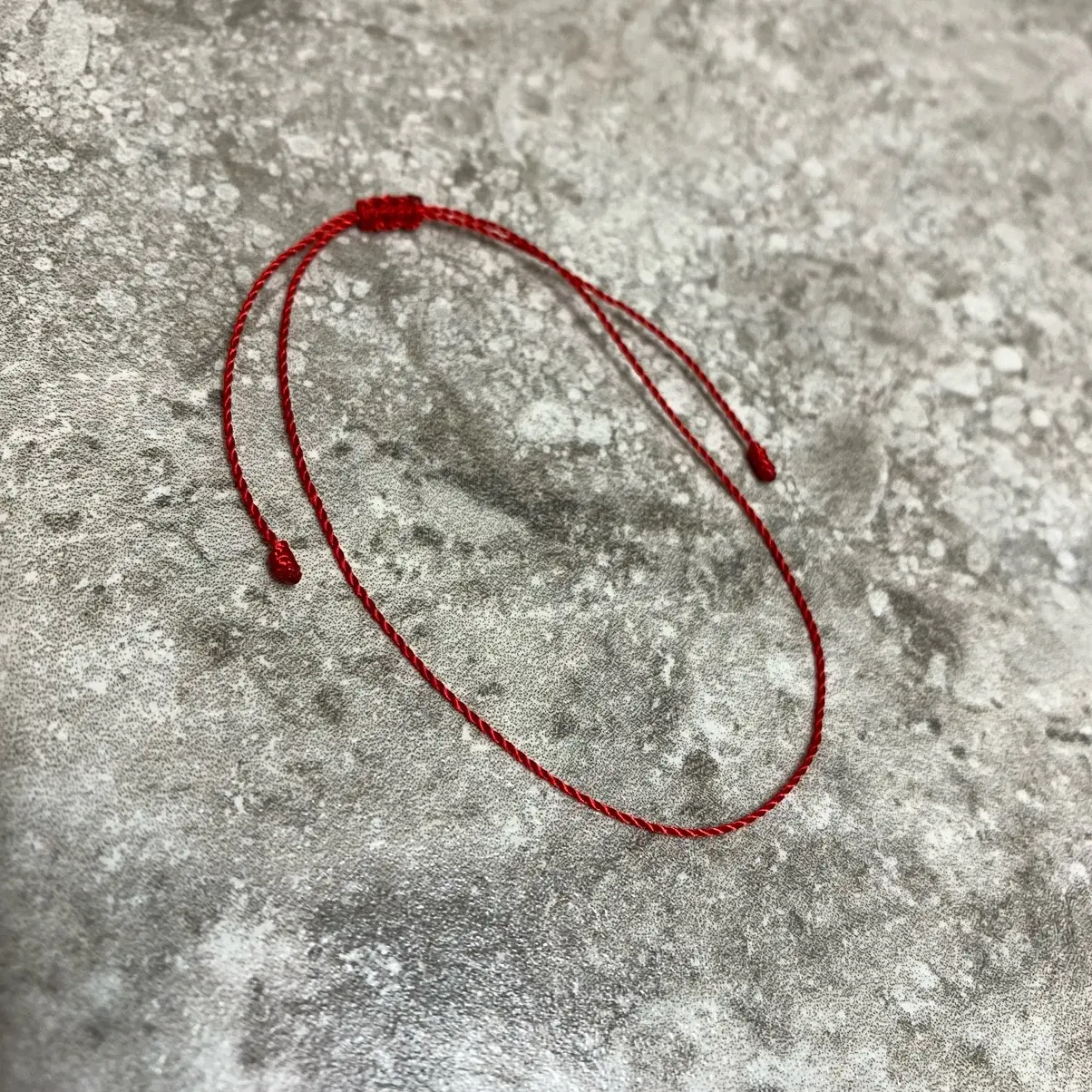 Tiny, thin and beyond minimalist red string bracelet. Daily Tiny, thin and beyond minimalist red string bracelet. Daily