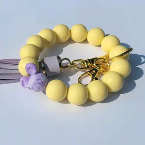 Purple & Yellow Mouse Wristlet