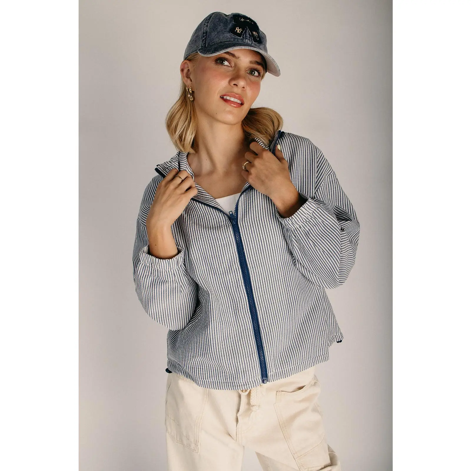 The Cecilia Zip-Front Drawstring Turtleneck Jacket in Navy Multi