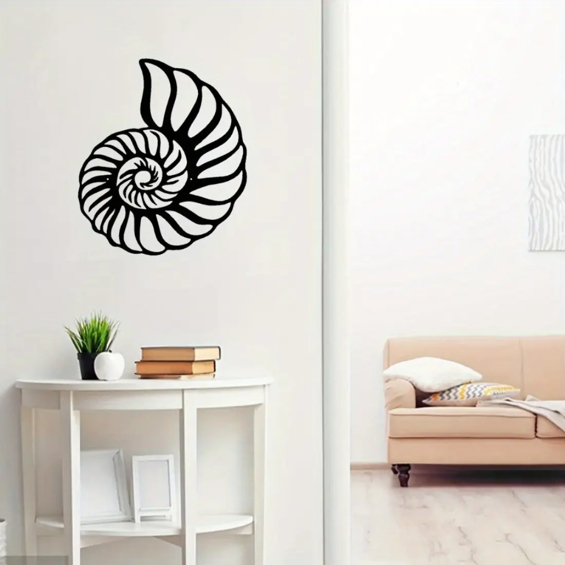 Elegant nautilus shell - themed metal wall art. Perfect for coastal - style homes, it infuses a touch of grace and sophistication into your interior.Decorative hanging ornaments Decorative Artwork