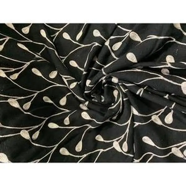 Black matka silk leaf embroidered fabric 45” wide.  Best used for home Decor. Sold by the yard
