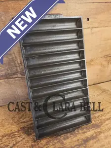 WOW, very cool. Raised Erie No. 22 Breadstick Pan.  Early 1900's No. 22 Corn Bread Pan, 11 cup 954