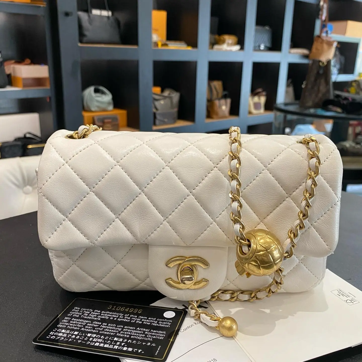 Pre-owned Chanel Mini Rectangular Pearl Crush Flap in white quilted lambskin with aged gold tone hardware, 31 series (2021) XH033
