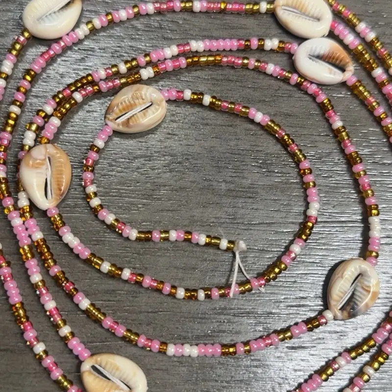 Pink cowrie kiss tie on waist beads