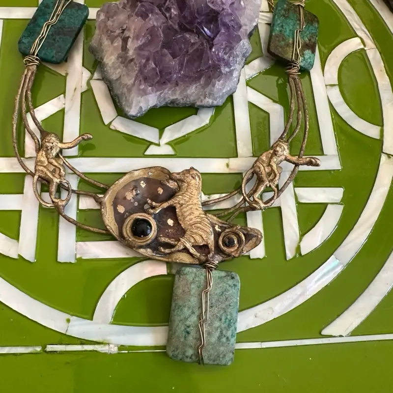 Turquoise Zebra & Brass Monkey Necklace with Unique Design and Durable Material