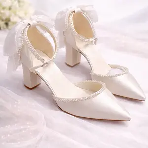 Elegant Ivory Pearl Bow Heels – Bridal Collection