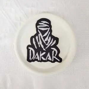 1PCS DAKAR black and white embroidered fabric patch with character design badges, suitable for DIY decorative patches on hats, bags, shoes, and clothing, made of durable materials with back hot melt adhesive that can be sewn, ironed, and washed