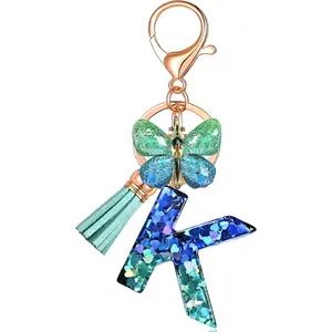 JINGUAZI Initial letter Keychains for Women Tassel Butterfly Pink Purple Cute Car Keychain for Wallet Backpack bag charm