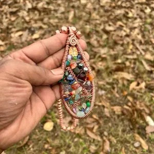 Multi gem copper medallion