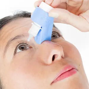 GentleDrop is an eye drop aid that makes eye drops easy.  Invented by two ophthalmologists it a silicon sleeve that fits over your eye drop bottle.