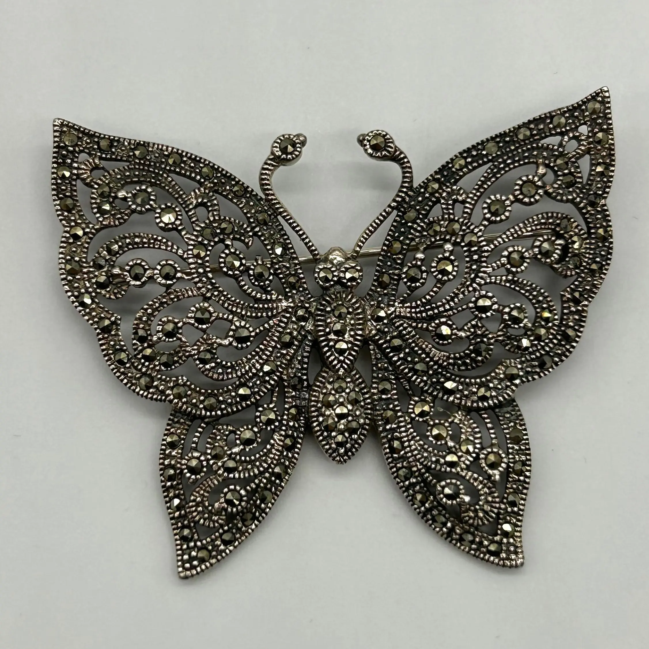 Elegant Butterfly Brooch and Marcasite Accents