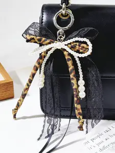 Leopard print fashion lace Pearl bag, personality classic Leopard print sweet   casual versatile pendant key chain, niche design exquisite daily accessories, retro Leopard print  matching suitable for small gifts.