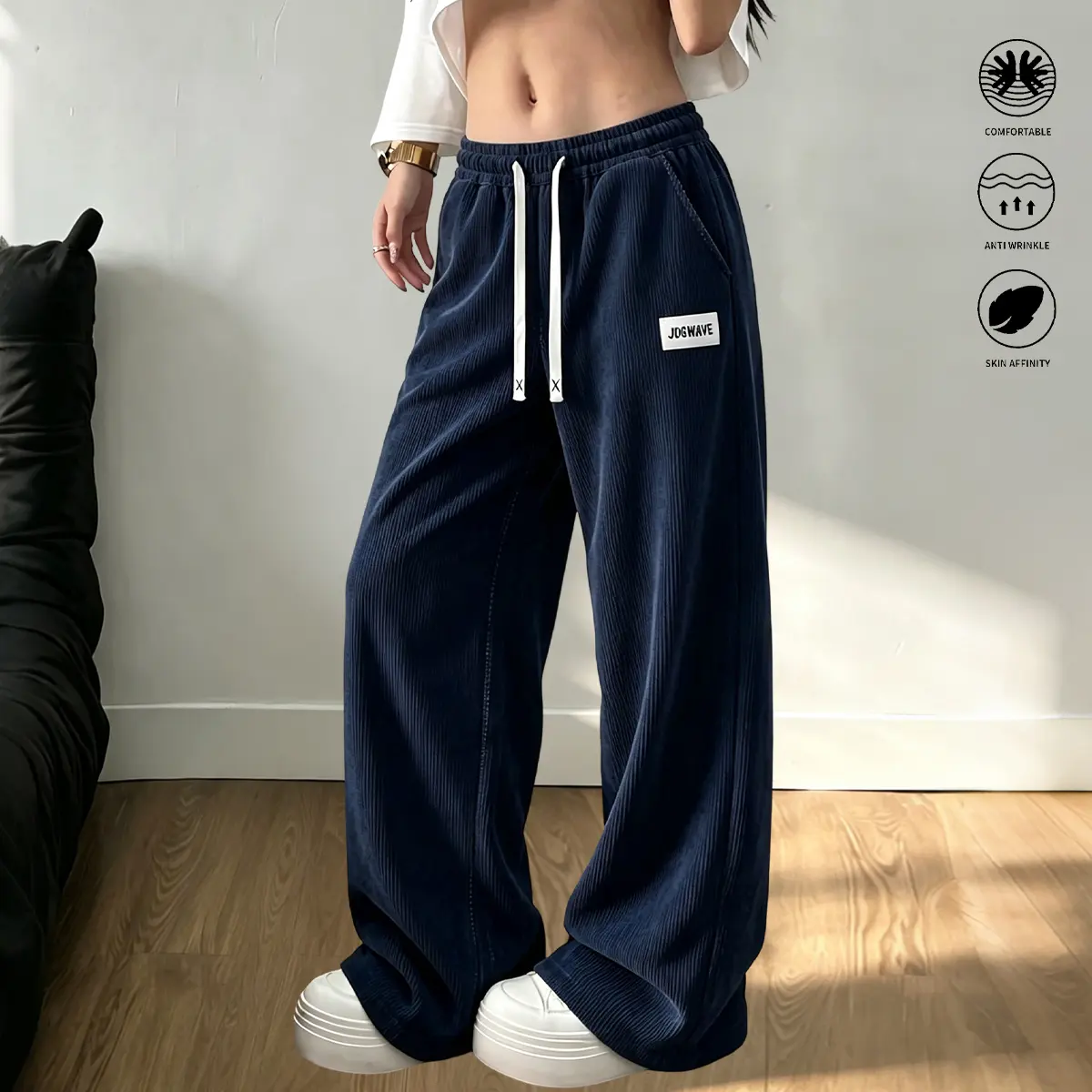 Women’s casual wide-leg pants with a drawstring design, solid color and comfortable fit; loose, relaxed trousers suitable for sports and everyday wear. Women’s clothing, ladies’ apparel.Loose-fit sweatpants