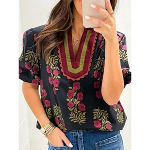 Floral bubble sleeve short contrasting cardigan shirt with stunning floral print, Rilake details, and striped patches.RAIMENTRY