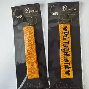Pull The Yellow tab wristlet keychain