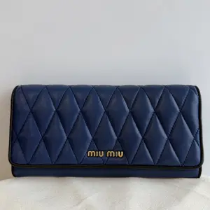 Pre-owned miu miu Royal Blue Diamond Quilted Lambskin Long Flap Wallet