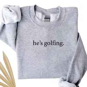 He’s Golfing Sweatshirt – Funny Golfer Wife Crewneck, Golf Season Pullover, Golf Mom Gift, Golf Lover Unisex Sweater