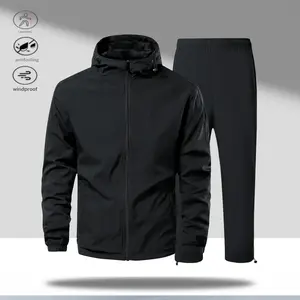 A men's hooded set with a simple casual style. The top features an adjustable hood design, making it easy to customize. The zipper closure allows for convenient wearing and taking off. The pants have an elastic waistband, providing a comfortable and snug