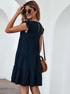 A women's solid color round neck short sleeve casual tiered dress with pleated flared hem, suitable for summer, beach vacations, gatherings with friends, and other casul occasions, Casual Bohemian Fashion, Womenswear
