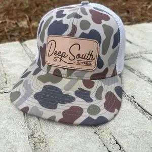 Lost Hat Co trucker, vintage camo with leather patch.