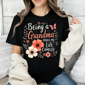 Being A Grandma Makes My Life Complete Floral Butterfly Print T Shirt Black Casual Loose Fit Tee For Women Perfect For Everyday Wear And Leisure Activities