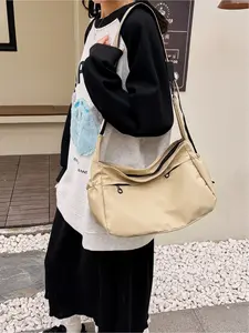 Large capacity casual versatile crossbody bag, solid color multi pocket mailman bag, luxurious and comfortable, lightweight shoulder bag, outdoor sports shopping universal bag