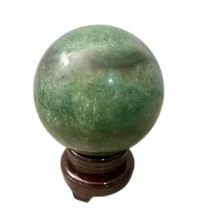 Large green strawberry quartz crystal sphere 5.73lbs 7inches tall with holder