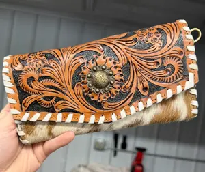Genuine hand tooled leather & cowhide wallet with wristlet and crossbody strap options