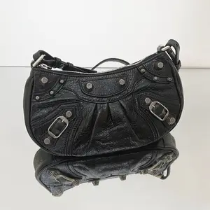 Pre-owned leather Crossbody Bags Balenciaga Le Cagole Mini Shoulder Bag in Black Arena Lambskin
