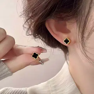 Black 4-leaf grass earrings for women, light luxury, niche design, fashionable and versatile earrings and earrings