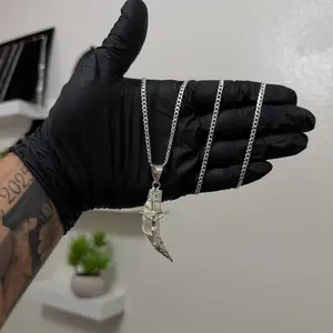 Conjunto  Cristo Colmillo Coyote con cadena Cubana 3mm x 24 pulgadas. Ambos en Plata 925