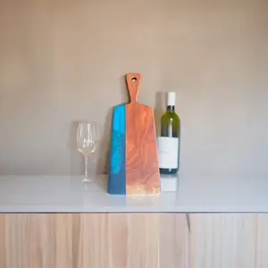 The Crafted Edge cutting board hand crafted with resin and live edge wood coastal colors wall art serving board
